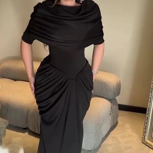 Sophisticated Black Dress

Black Pleated Top Dress Two-Piece Set